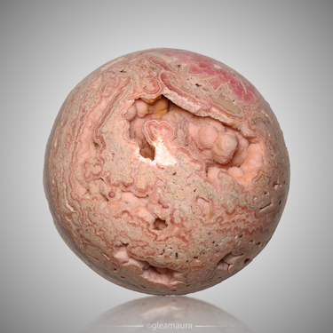 Rhodochrosite Sphere, natural mineral specimen from Capillitas mining district, Argentina (view 1)