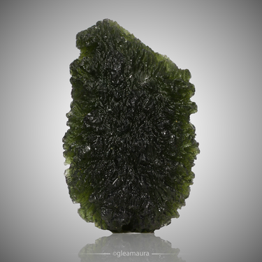 Moldavite, natural mineral specimen from Nesměň, Czech Republic (view 1)