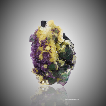 Muscovite & Schorl On Fluorite, natural mineral specimen (view 1)