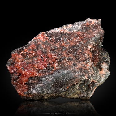 Rhodochrosite, natural mineral specimen from Moanda Mine, Gabon (view 1)