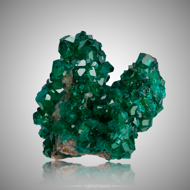 Dioptase with Calcite, natural mineral specimen from Tsumeb Mine, Namibia