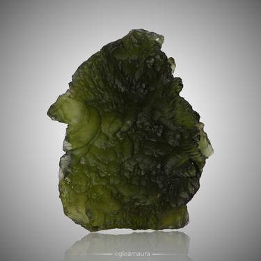 Moldavite, natural mineral specimen from Nesměň, Czech Republic (view 1)