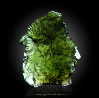 Moldavite, natural mineral specimen from Nesměň, Czech Republic (view 2)